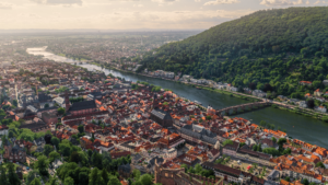Aerial shot of the city of Heidelberg by the river captured in Germany